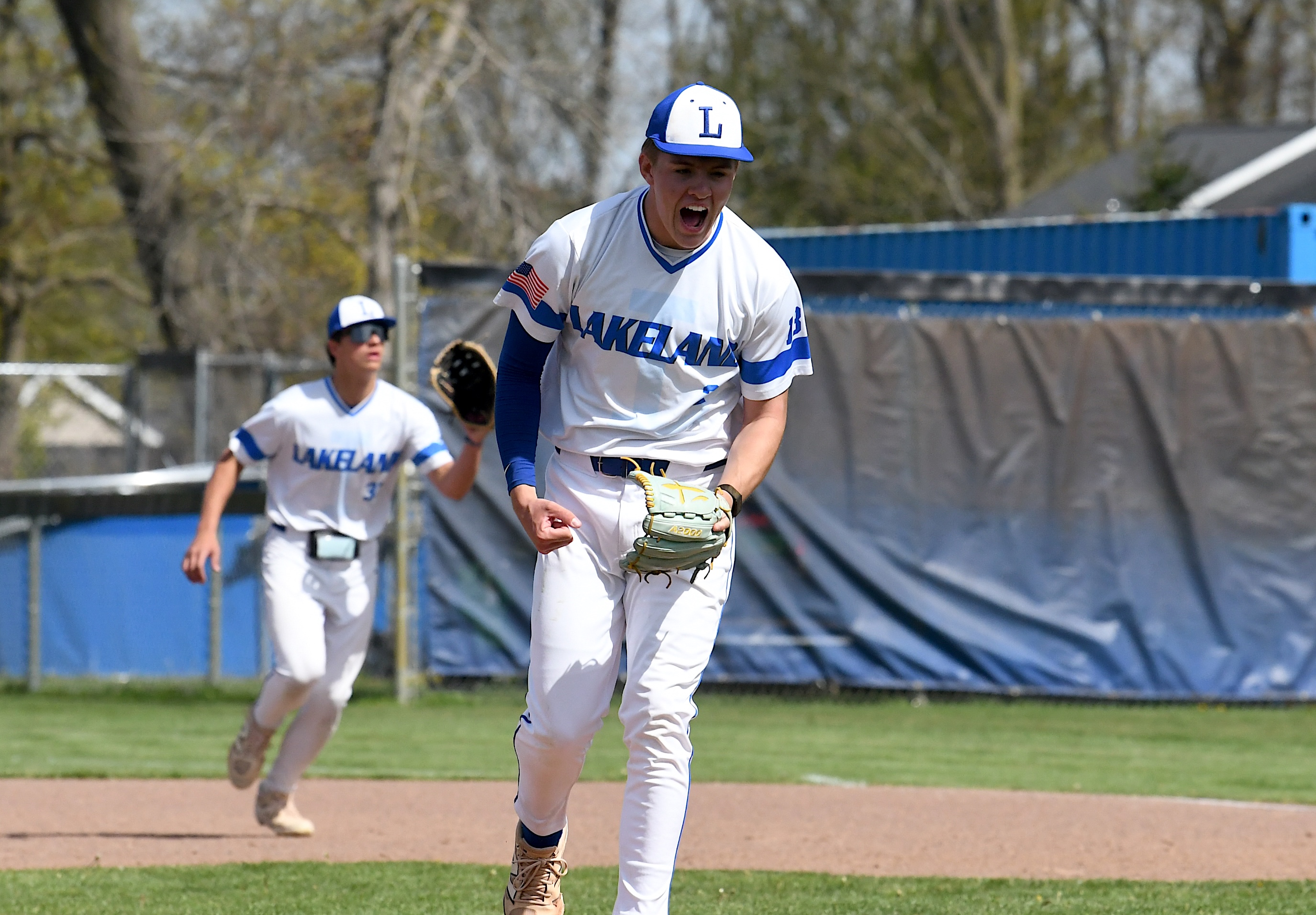 Lakeland's Ethan Rowley is pumped up after getting out of...