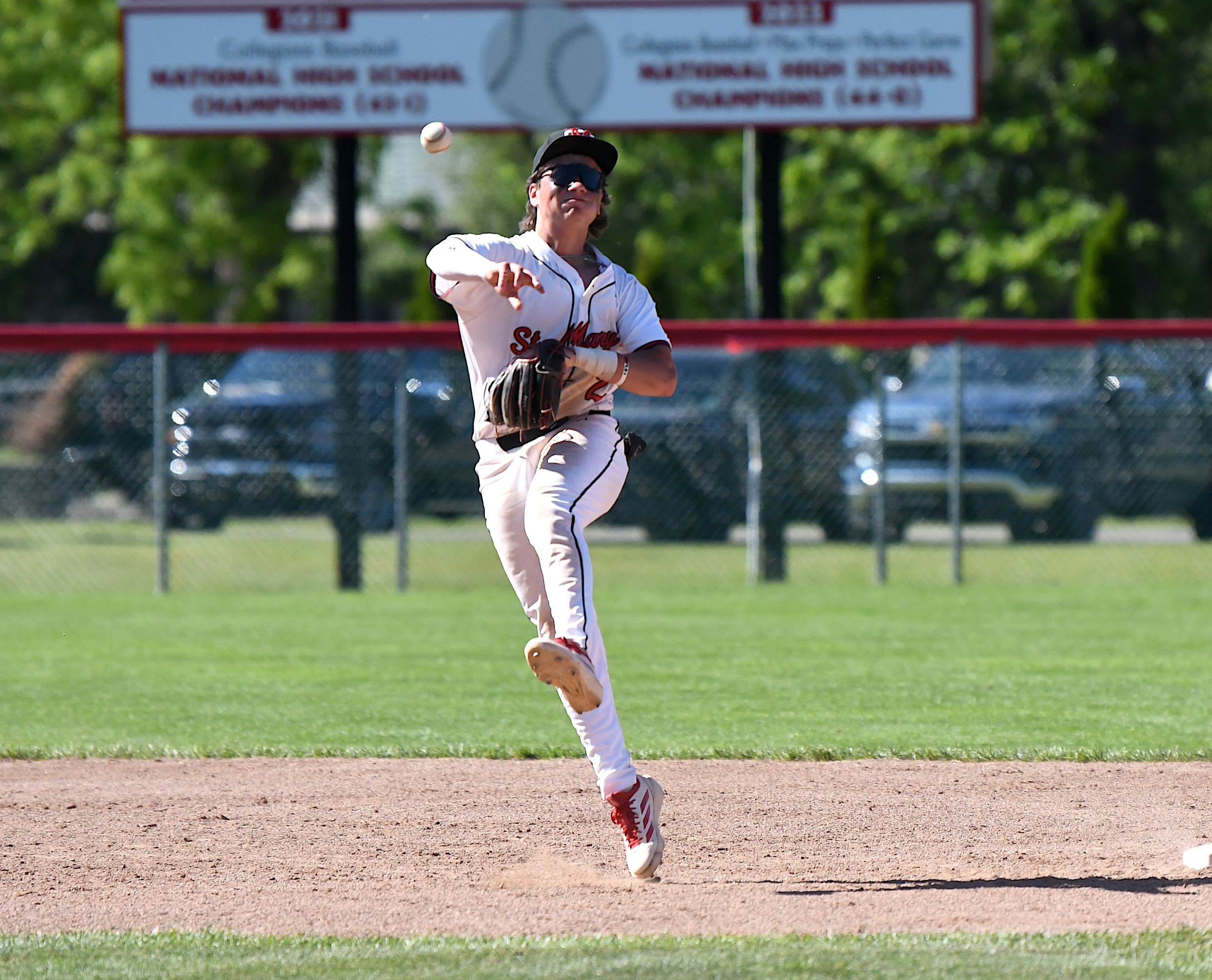 Orchard Lake St. Mary's second baseman Joe Schilp makes a...