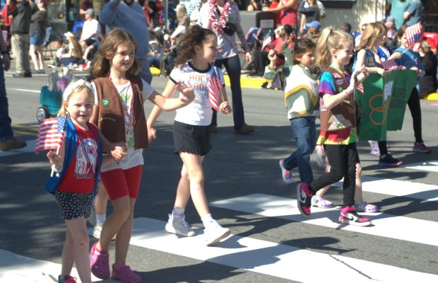 Girl Scouts were among those marching along the parade route Monday. (JEFF PAYNE--For MediaNews Group)
