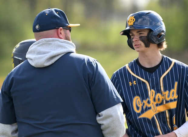 No. 1-ranked Rochester Adams beat No. 3 Oxford, 3-1, on Thursday, May 7, taking the rubber match to win the three-game OAA Red series between the league leaders. (MATTHEW B. MOWERY  MediaNews Group)
