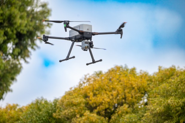 four-propeller drone in flight
