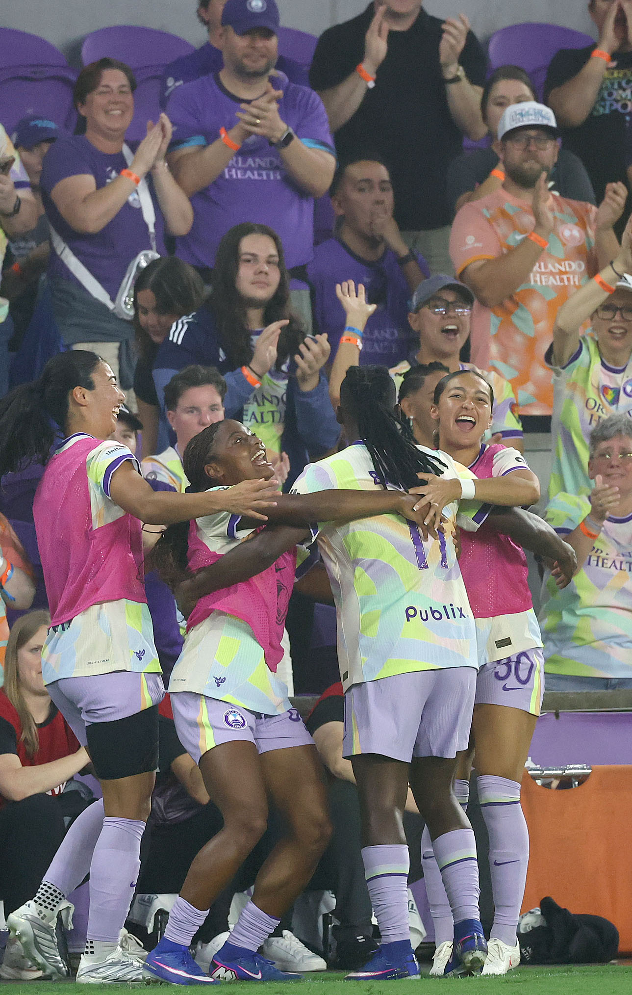 Orlando player Barbra Banda celebrates with players after scoring a...