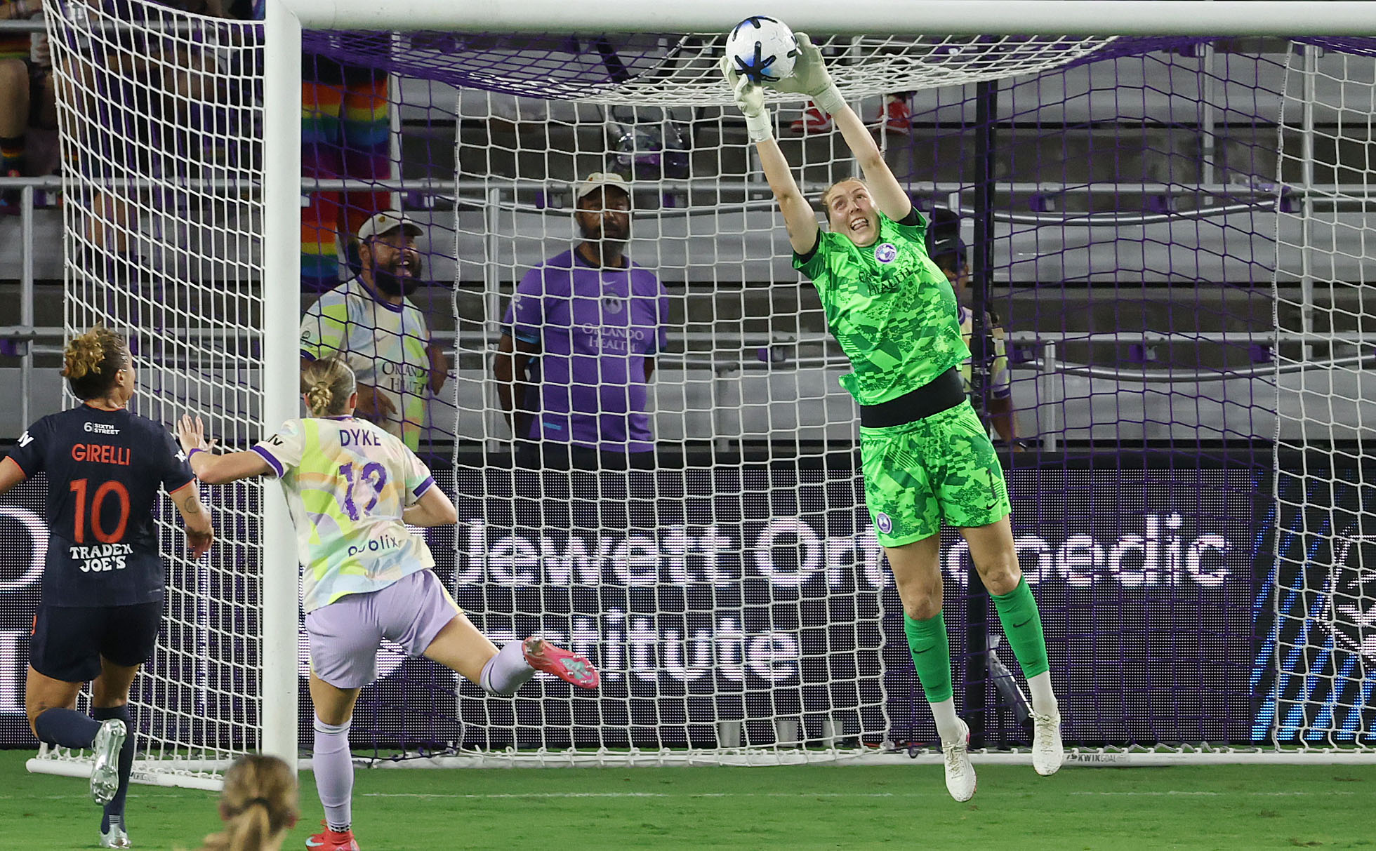 Orlando goalkeeper Anna Moorhouse leaps to make a save during...