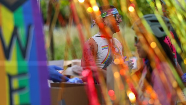 Alex Silverman hands out lunches to cyclists at the lunch stop of the Cycle to Zero event, by the San Francisco AIDS Foundation, at Southwest Community Park in Santa Rosa on Friday, May 29, 2026. (Christopher Chung/The Press Democrat)