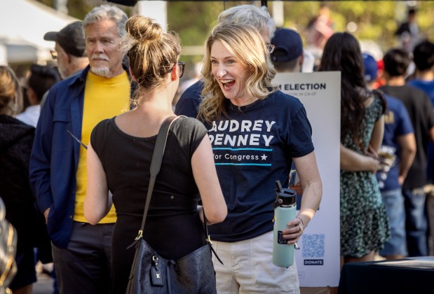 Audrey Denny, a candidate for U.S. House California District 1, talks with voters during the Wednesday Night Market May 20, 2026 in Santa Rosa's Old Courthouse Square. (John Burgess/The Press Democrat)