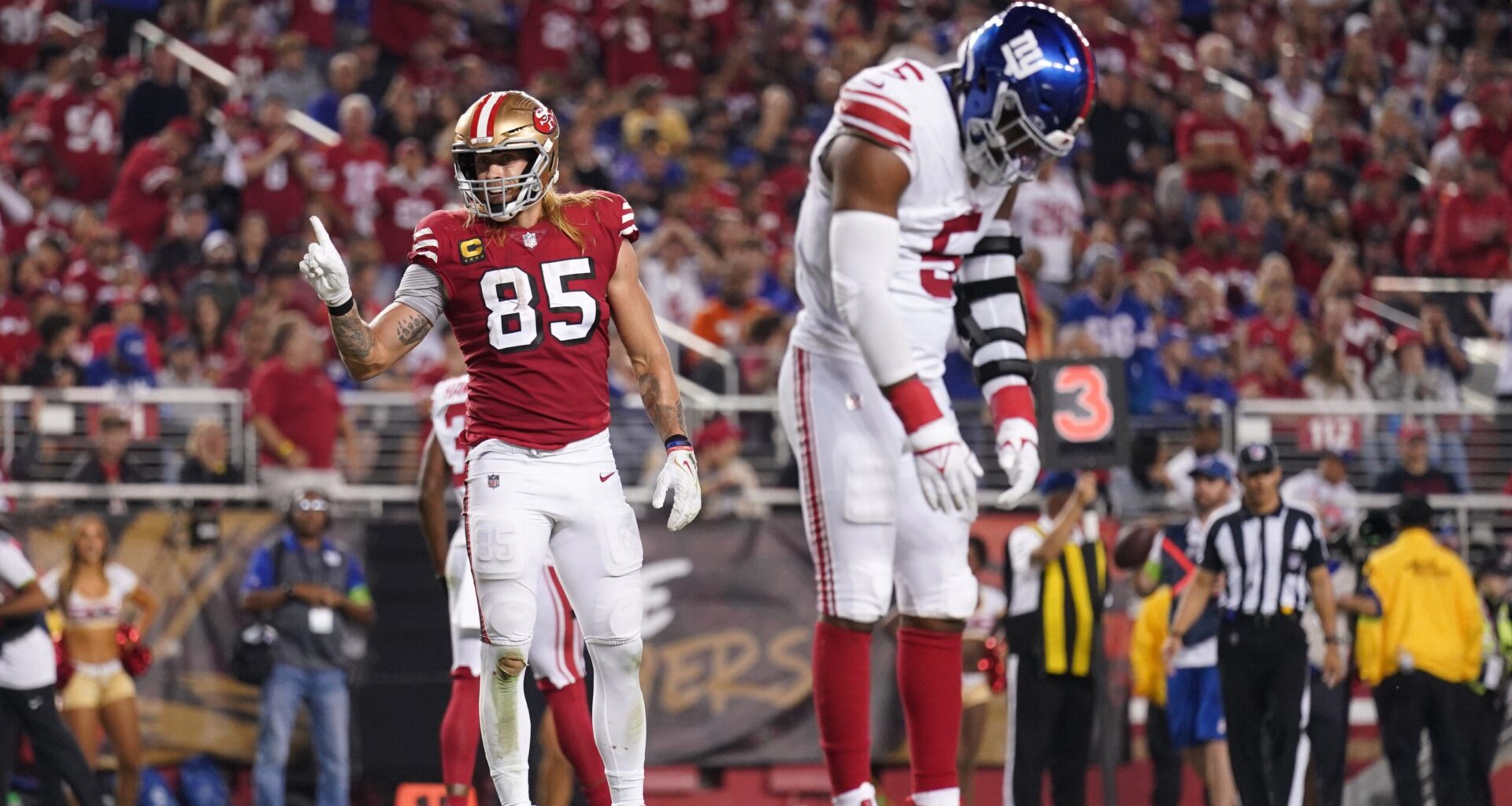 Sep 21, 2023; Santa Clara, California, USA; San Francisco 49ers tight end George Kittle (85) points his finger next to New York Giants linebacker Kayvon Thibodeaux (5) after the Giants were called for a penalty in the third quarter at Levi's Stadium.