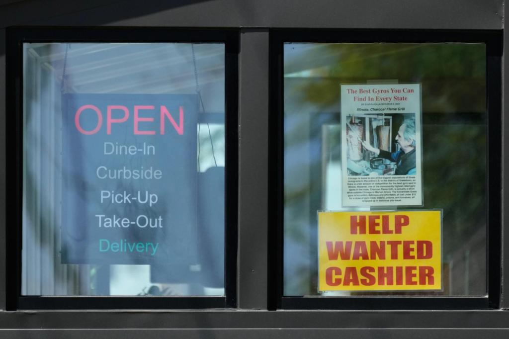 US jobless claims rise to 215,000 but remain low despite uncertainty