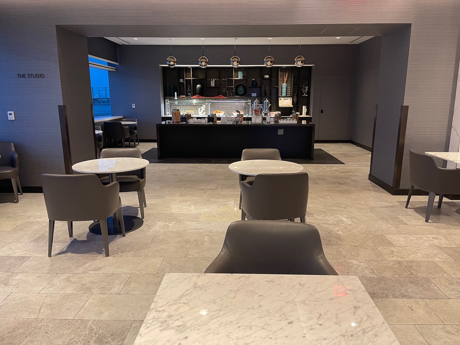 a room with tables and chairs
