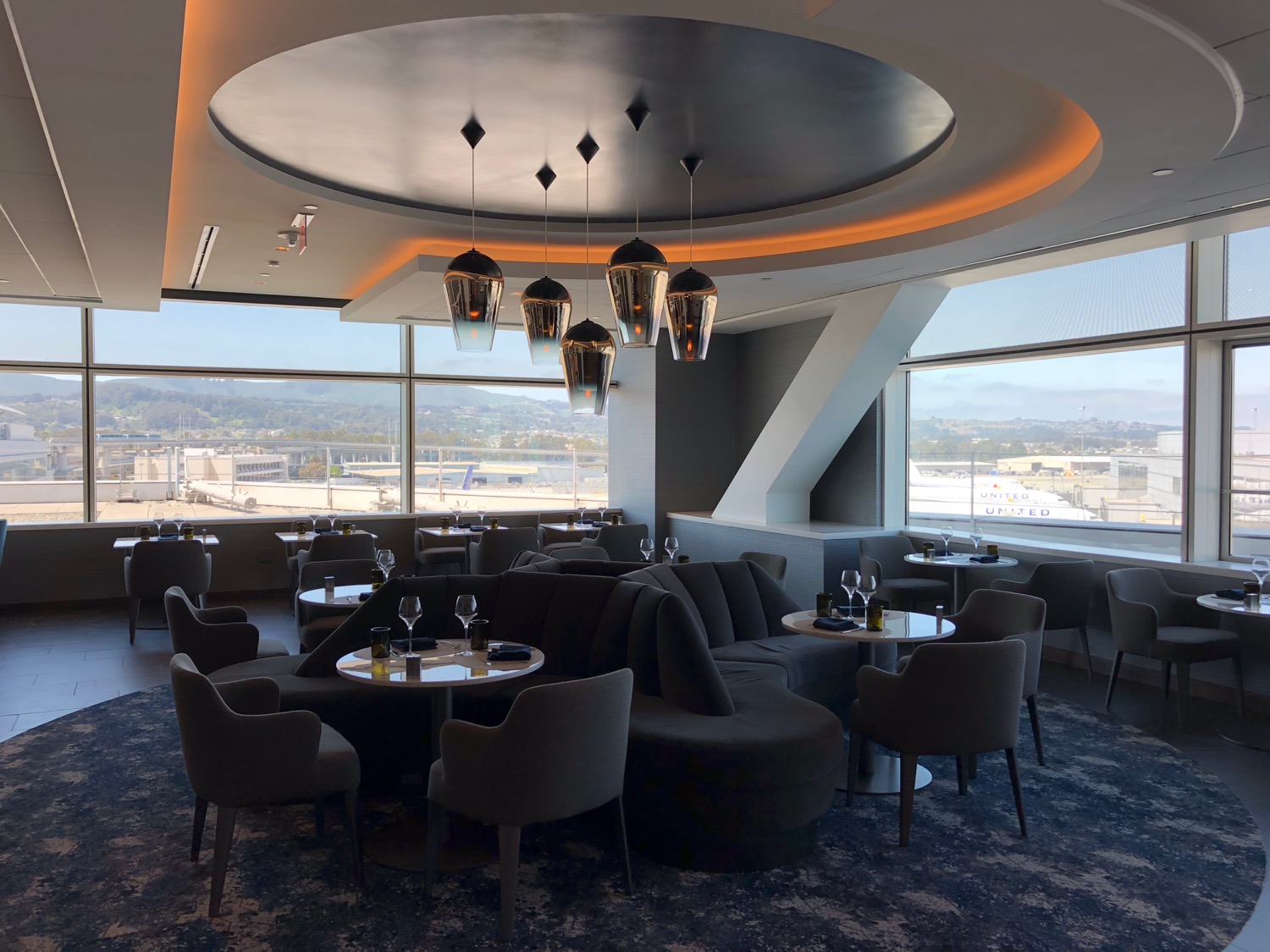 a room with tables and chairs