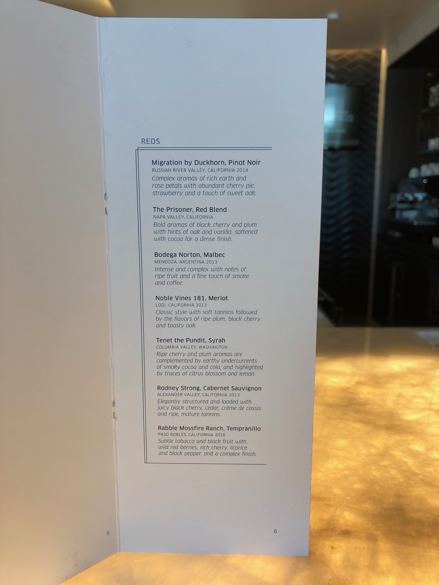 a white sign with black text