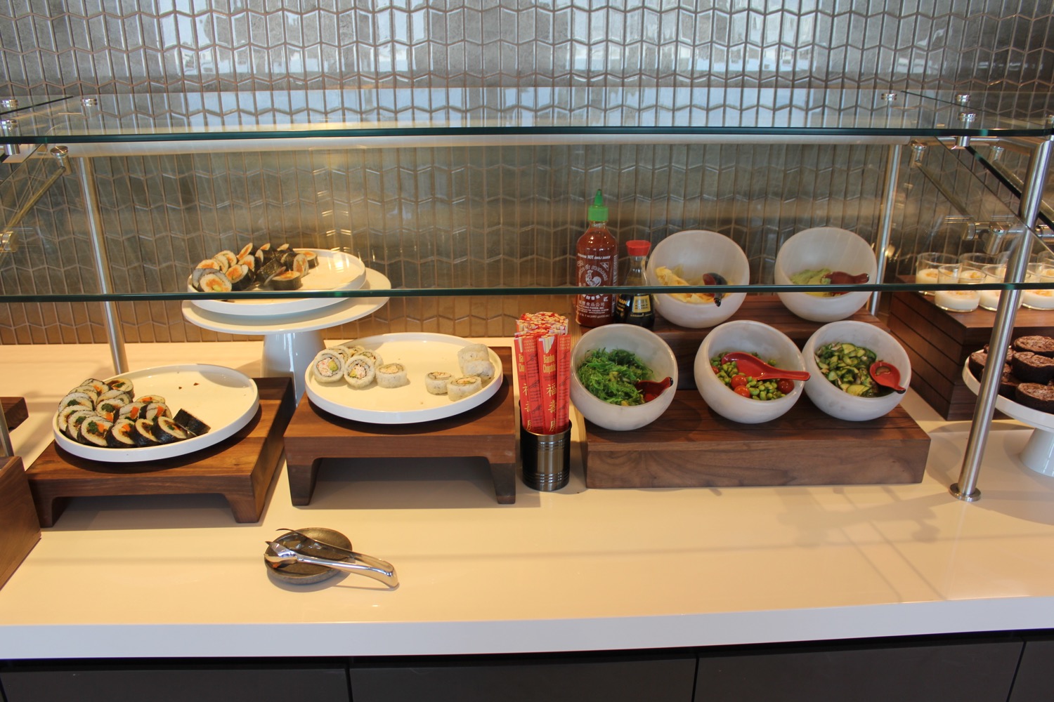 a buffet with different kinds of food on plates