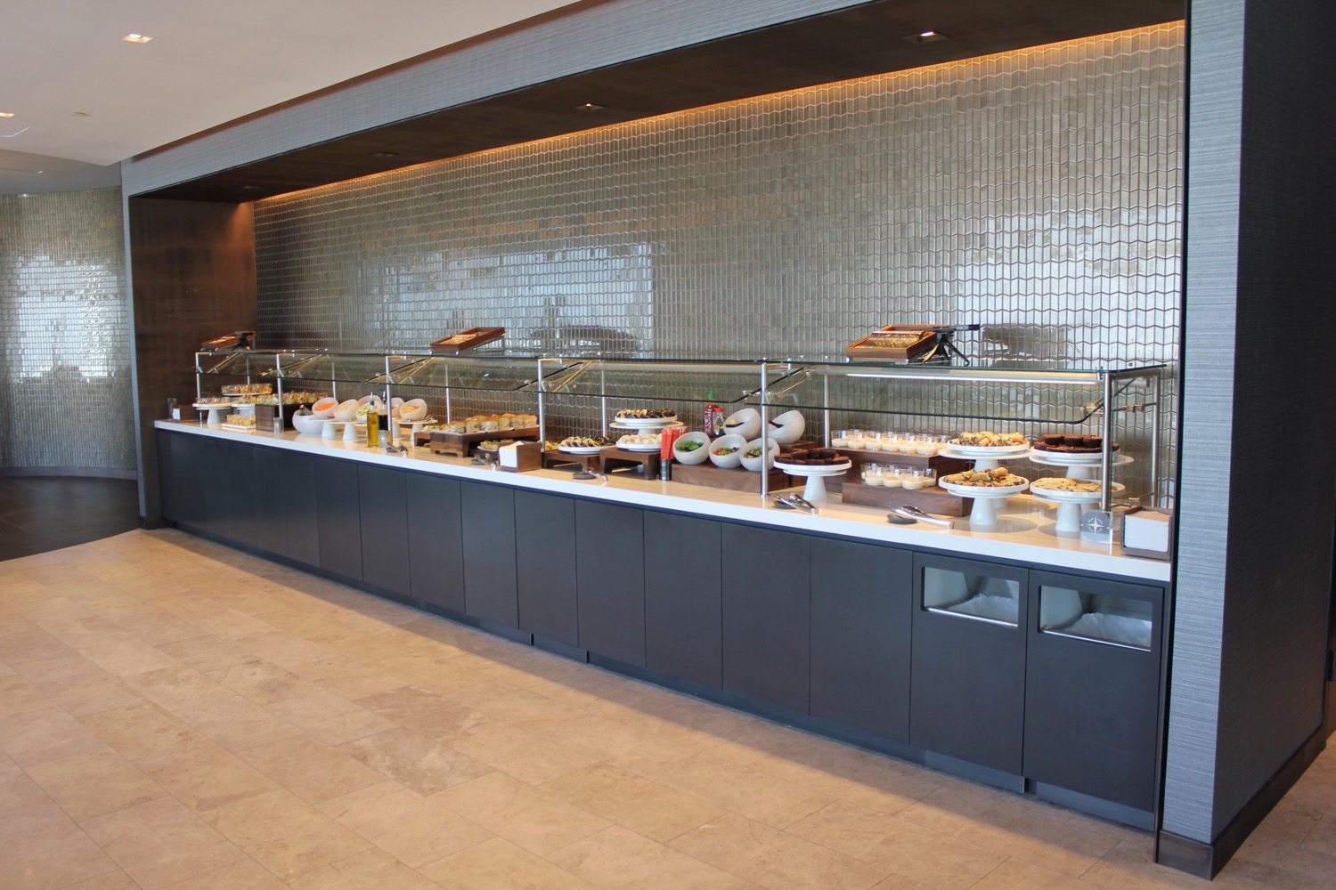 a buffet line with food on it