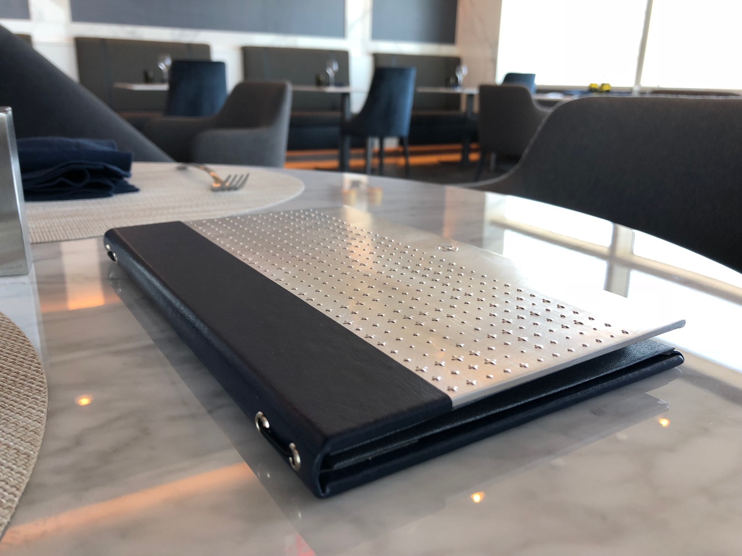 a restaurant menu on a table
