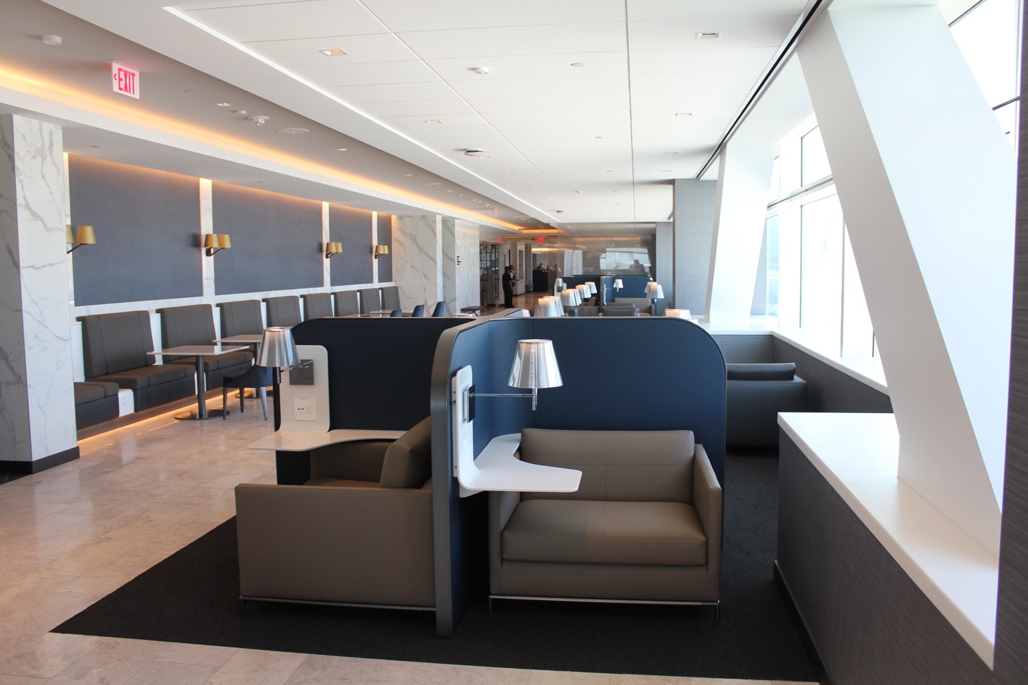 a room with chairs and tables