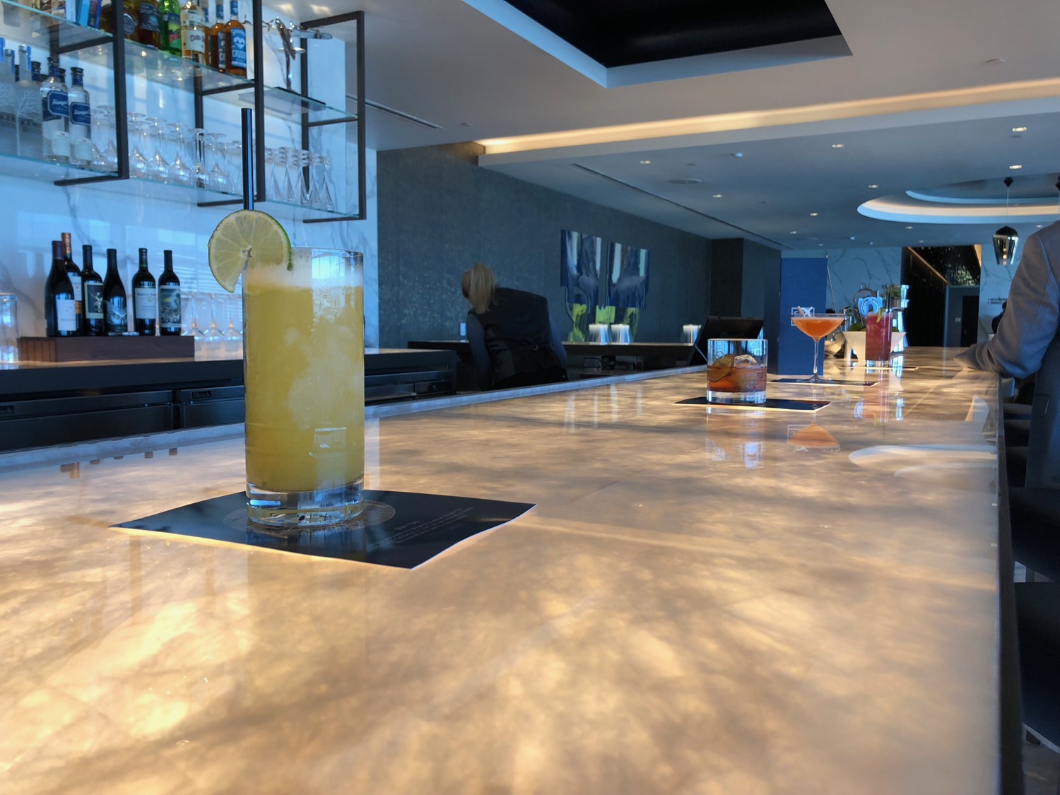 a glass of liquid on a counter