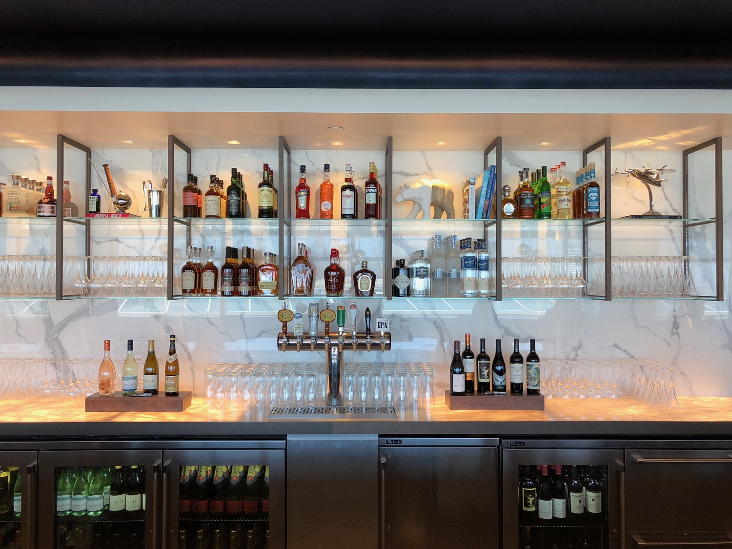 a bar with bottles and glasses