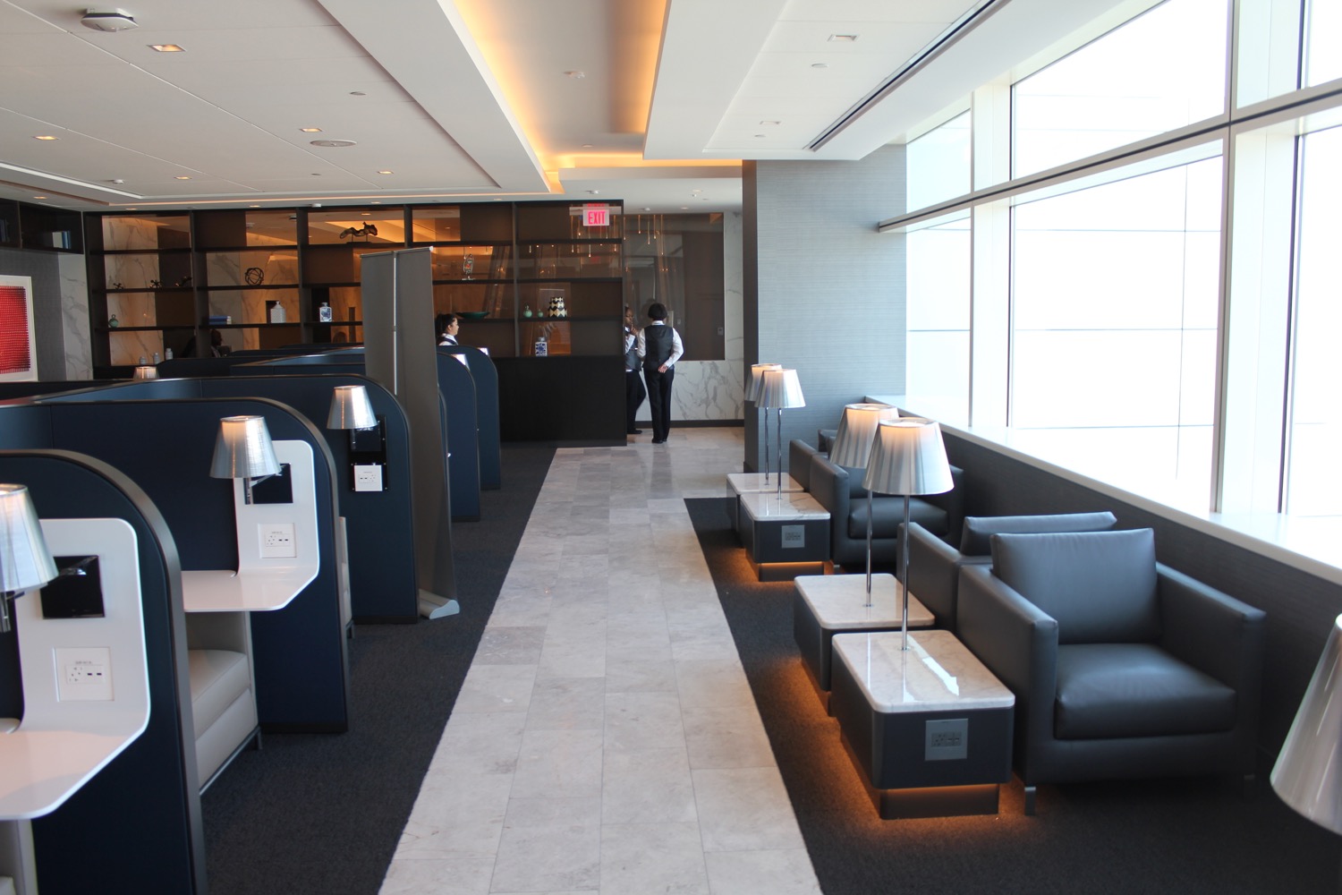 a room with couches and tables
