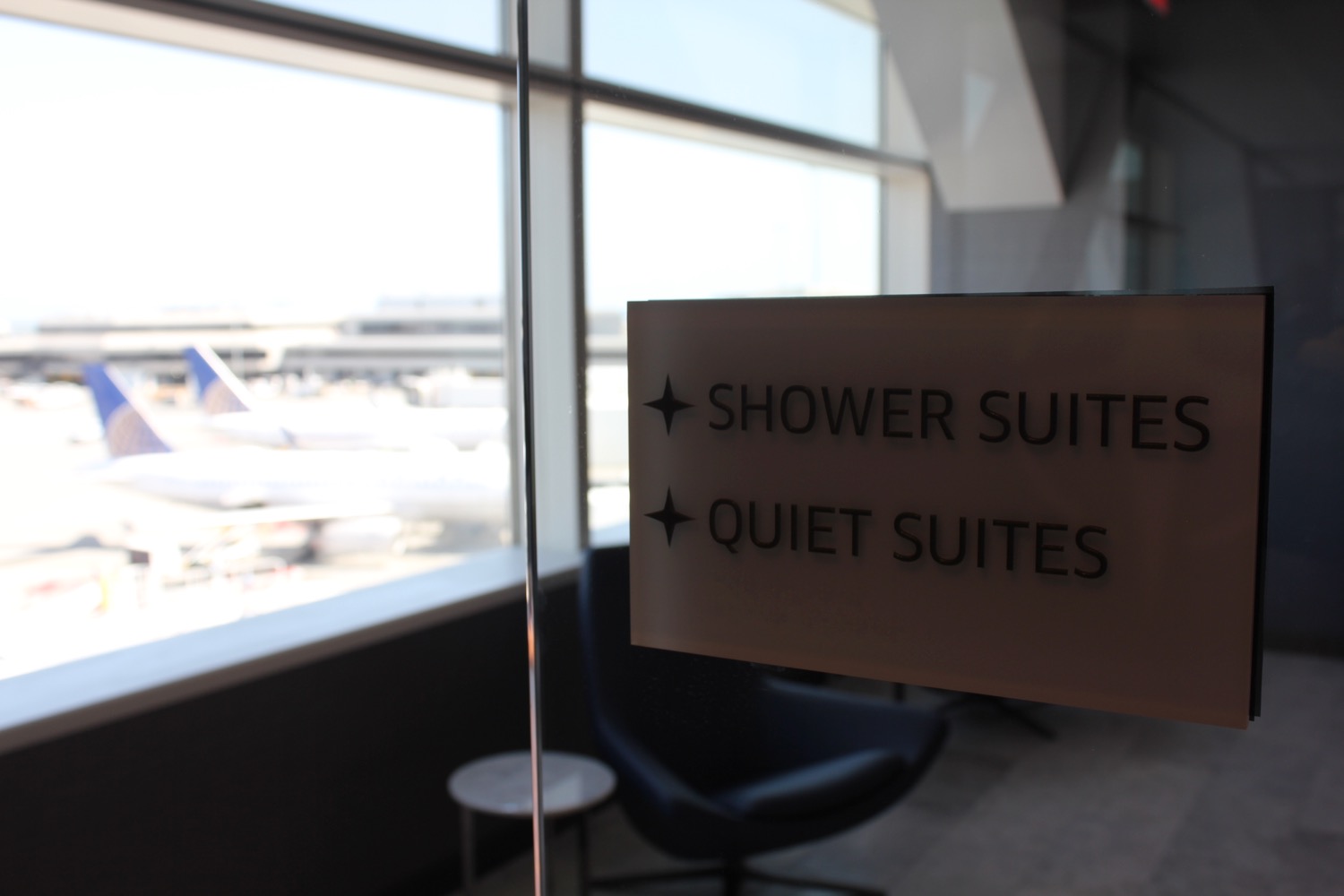 a sign on a glass door