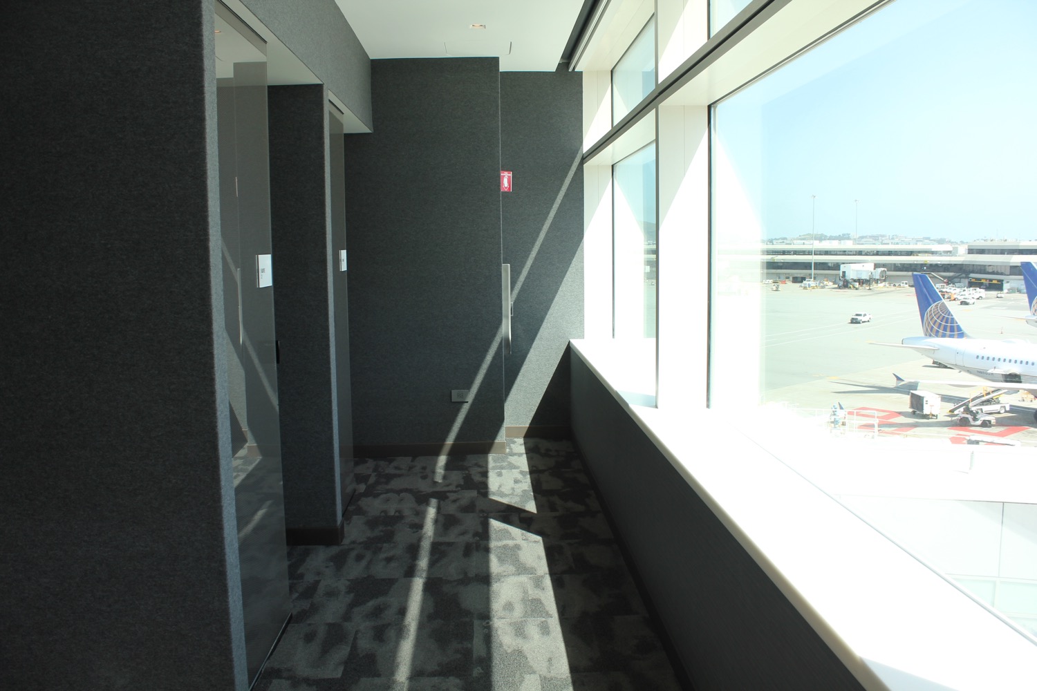 a room with a window and a lot of windows