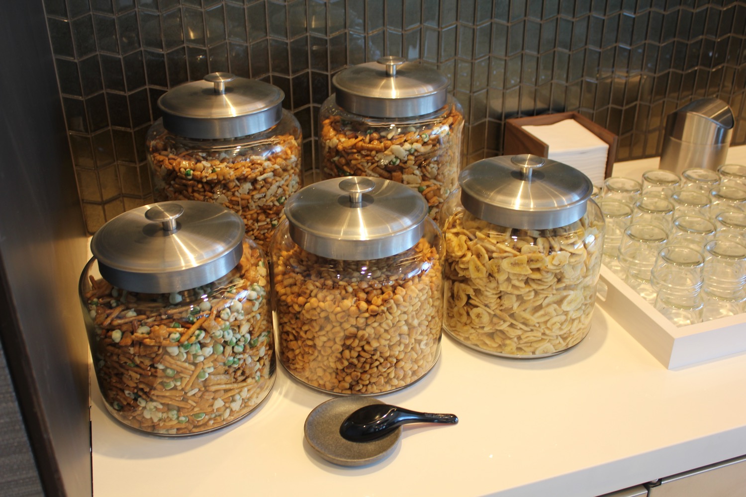 a group of glass containers with food in them