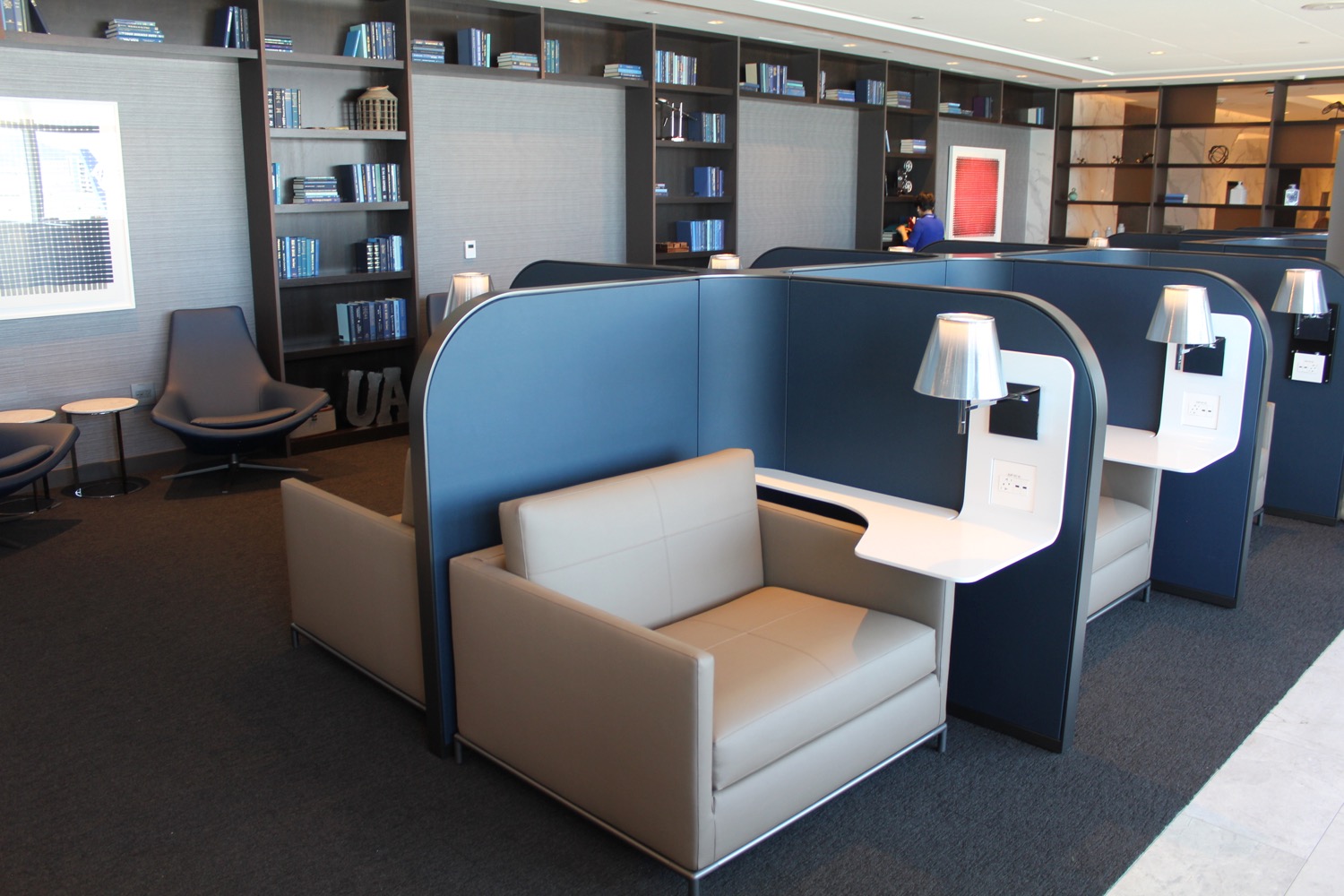 a room with chairs and a desk