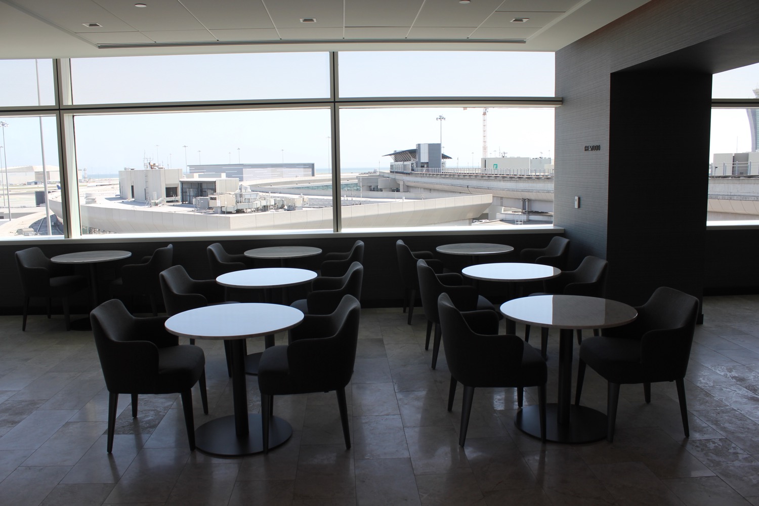 a room with tables and chairs