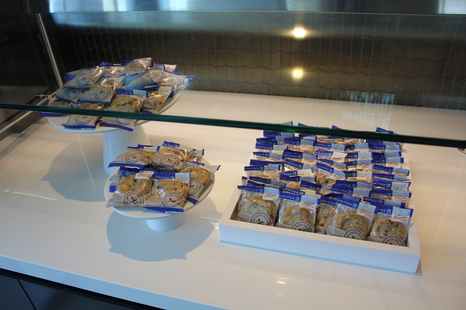 a display case with food in bags