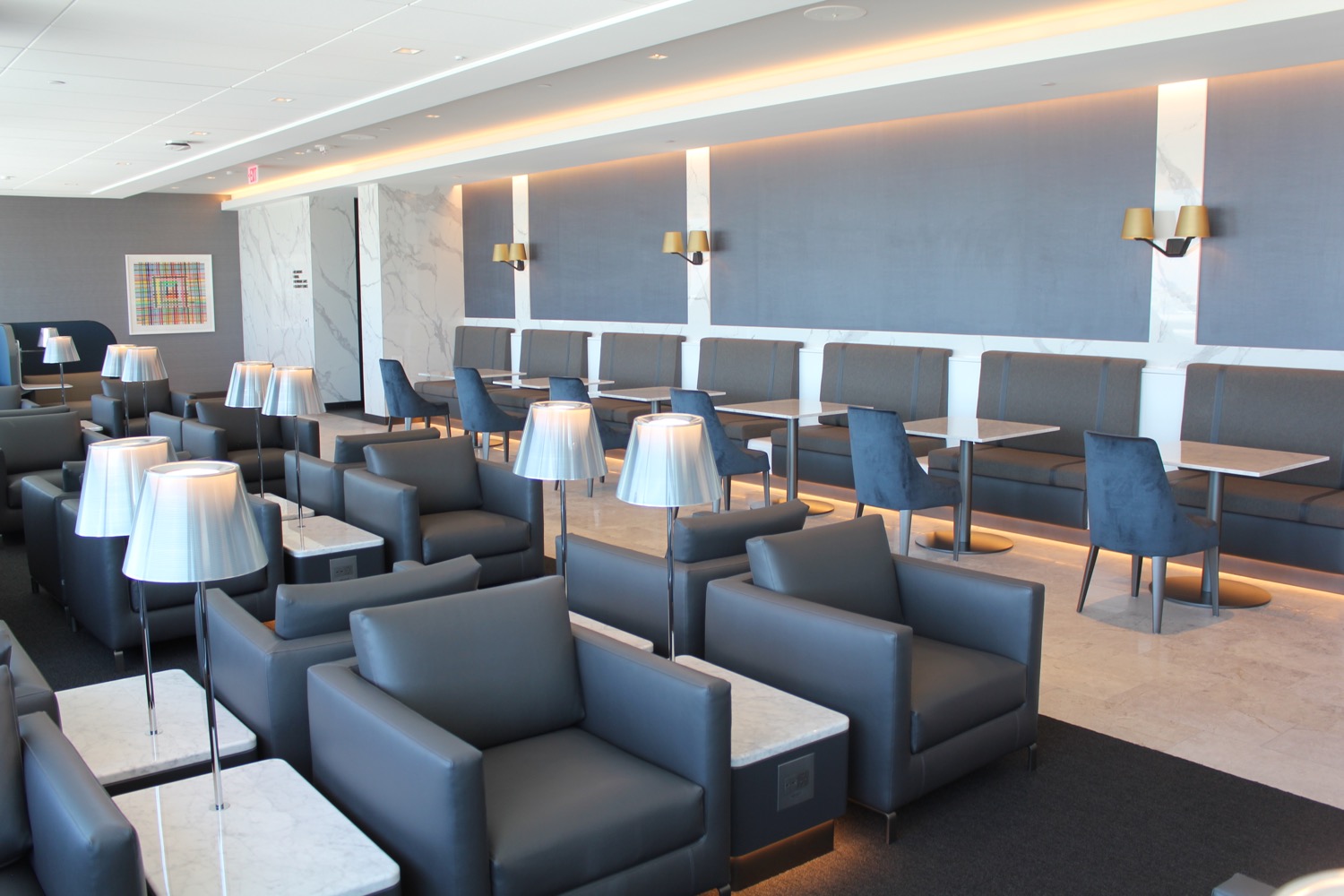 a room with chairs and tables