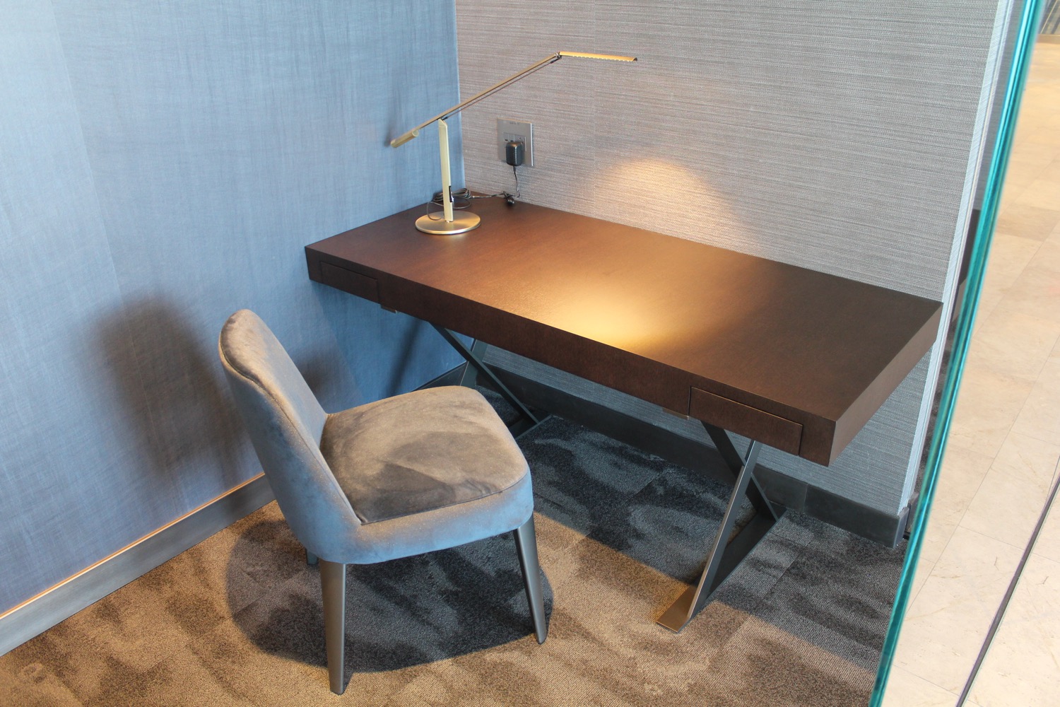 a desk and chair in a room