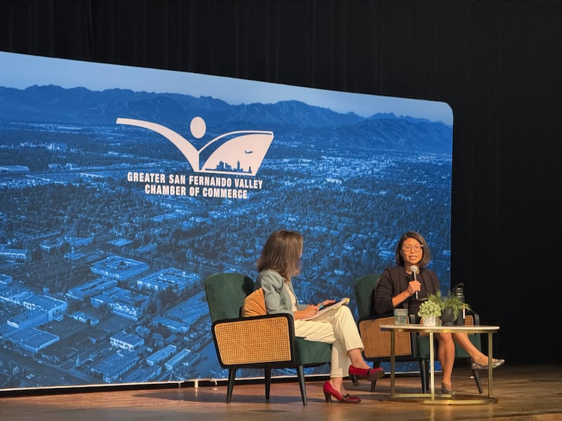 Reverend Rae Huang speaks with moderator Alex Cohen at Los Angeles Valley College on May 20.