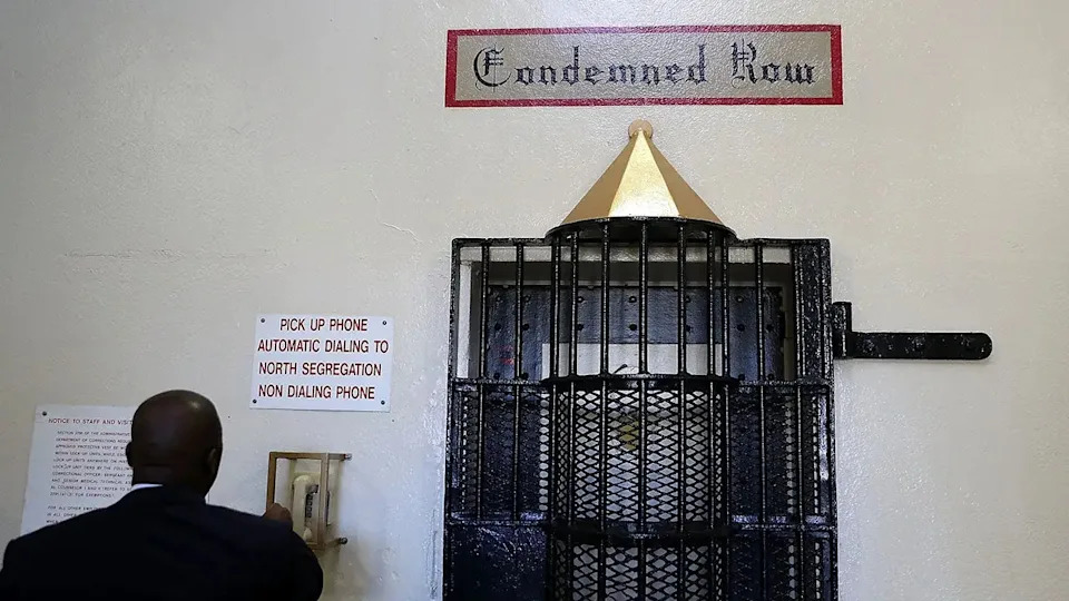 Lt. Sam Robinson calls to open a door at San Quentin State Prison death row