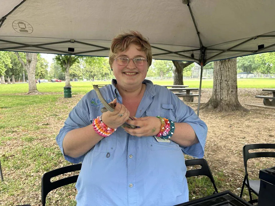 Heather Lindsay, guide for Sacramento Splash, holds a snake at SnakeFest in Hagan Community Park in Rancho Cordova. SnakeFest is an annual festival to celebrates California’s snake population.