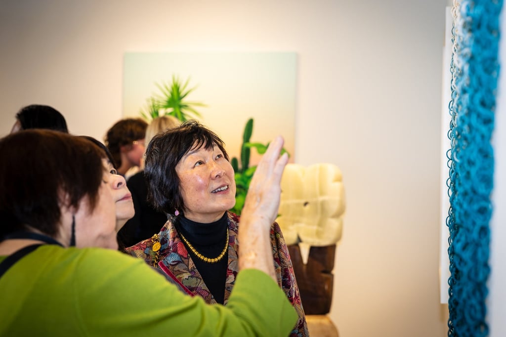 Visitors view artworks on the fair’s opening night on April 16. Photo: Hunter Ridenour/AMP