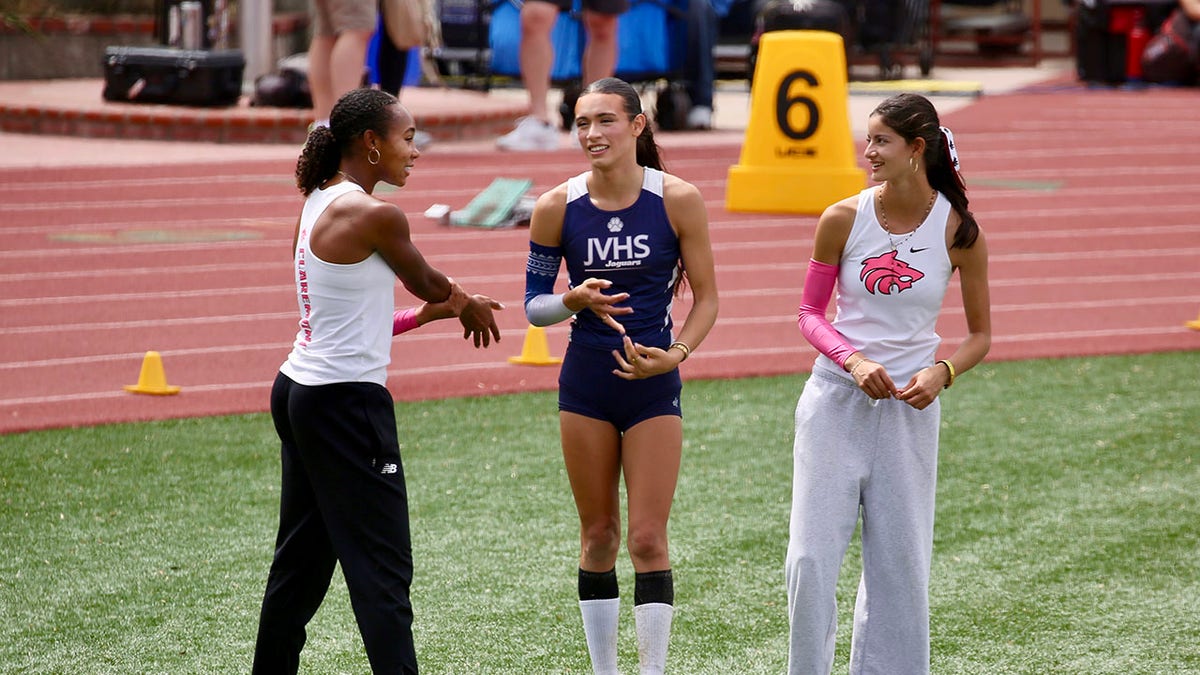 AB Hernandez speaking to other athletes at a track and field meet in Moorpark, California