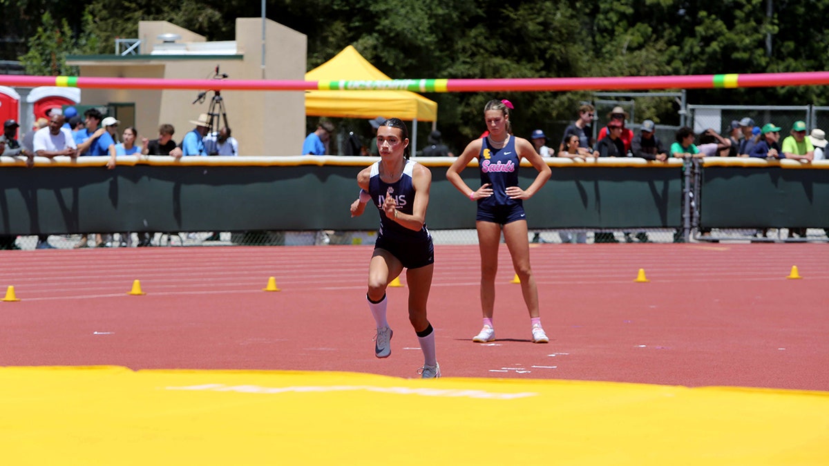 AB Hernandez jumping during girls high jump event at California track meet