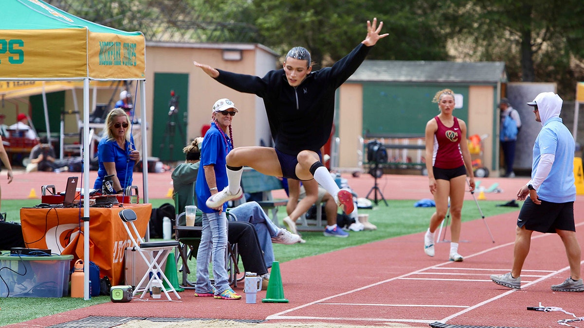 AB Hernandez jumping during practice at Jurupa Valley High School