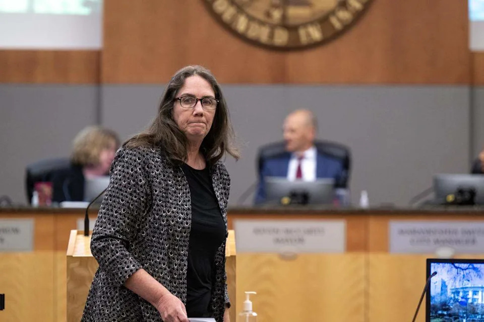 Lisa Bates of Sacramento Steps Forward leaves the podium after speaking during the Sacramento City Council meeting on April 28 about proposed frameworks for a joint powers authority between local cities and the county to address homelessness.
