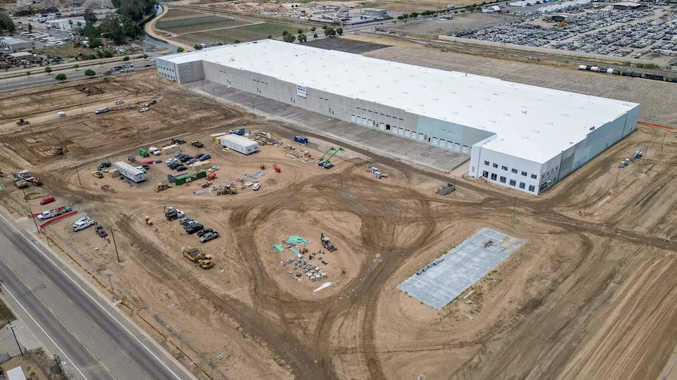 A giant warehouse is shown under construction on the northeast corner of Marks and Nielsen in west Fresno. The project, which was proposed more than five years ago, will result in three warehouse buildings totaling more than 800,000 square feet.
