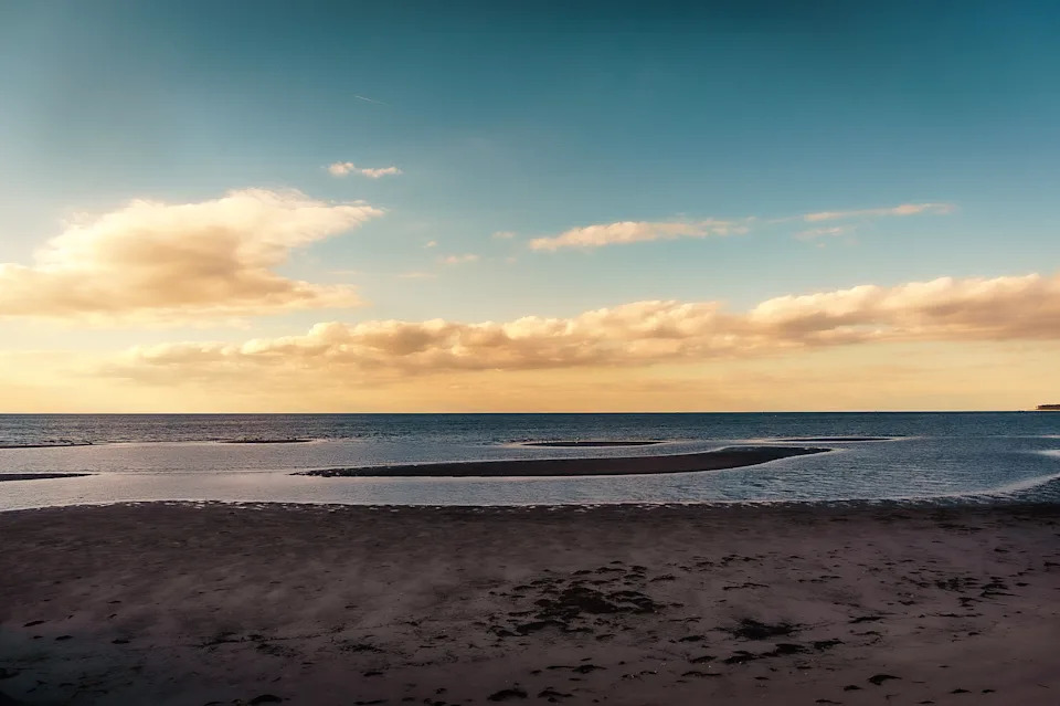 Cape Charles Beach is known for calm Chesapeake Bay water, soft sand, and an easy small-town setting on Virginia's Eastern Shore.