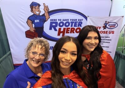 Rooter Hero Plumbing & Air booth at the Southern California Facilities Expo. Caption: “Pictured left to right are Janet Donelan, Julia Rodriguez, and Katherine Conchas. The team stands behind the Rooter Hero display, where they engaged attendees and shared insights into the company’s commercial plumbing capabilities.