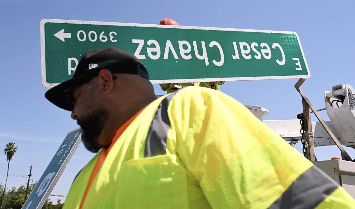 City of Fresno crews begin taking down the Cesar Chavez Blvd. signs replacing with Ventura Street signs Friday morning, May 1, 2026 in Fresno.