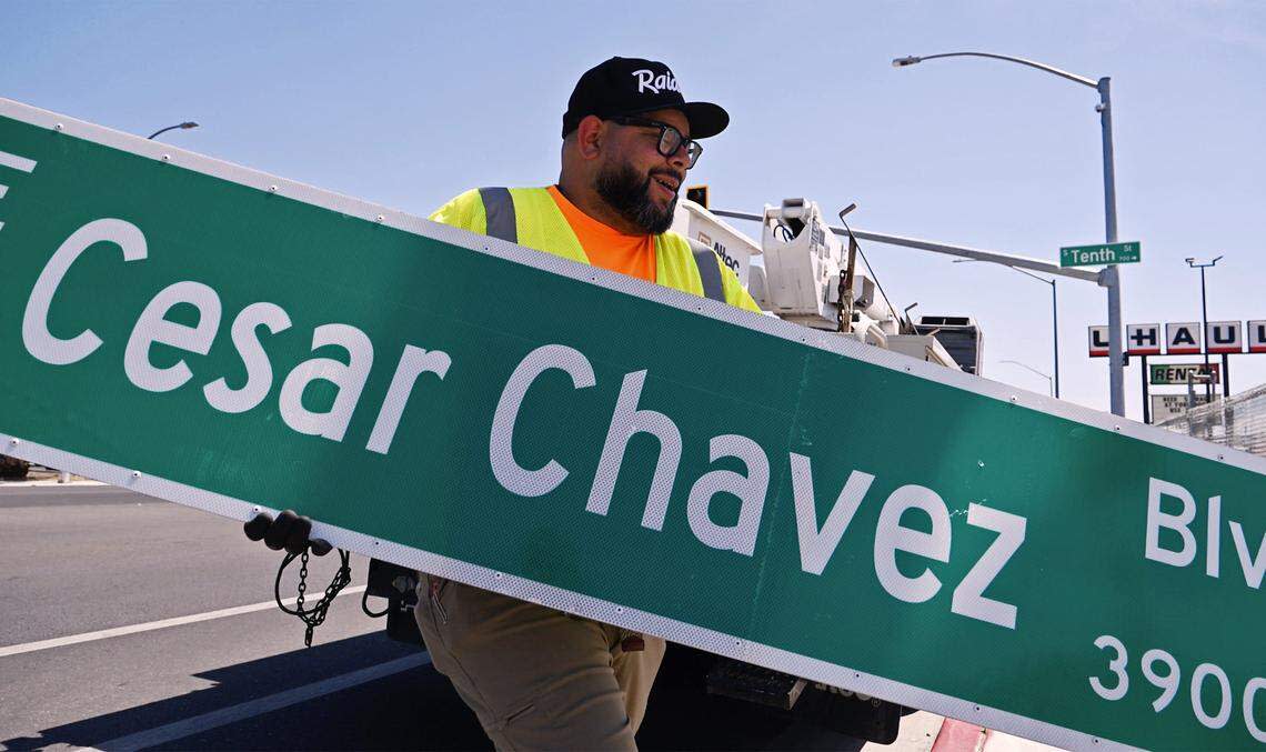 City of Fresno crews begin taking down the Cesar Chavez Boulevard street signs replacing with Ventura Street signs Friday morning, May 1, 2026 in Fresno.