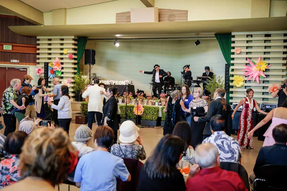 Dozens of seniors hit the dance floor during Senior Prom at the County Fair Building at Golden Gate Park in San Francisco on Wednesday. (Brontë Wittpenn/S.F. Chronicle)