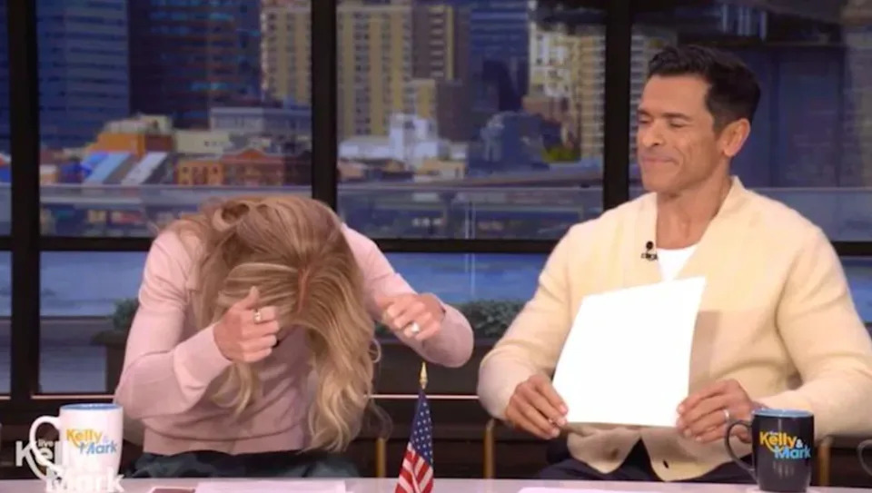 Kelly demonstrating how she dries her hair