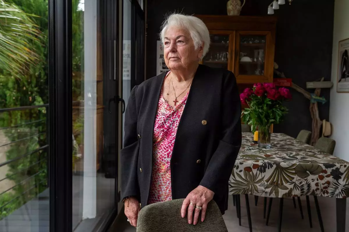 Marie-Therese Ross-Mahe, an 85-year-old French widow of a U.S. military veteran, poses in Orvault, western France, during an interview with The Associated Press as she describes her detention in a Louisiana immigration facility last month, Monday, May 11, 2026. (AP Photo/Mathieu Pattier)