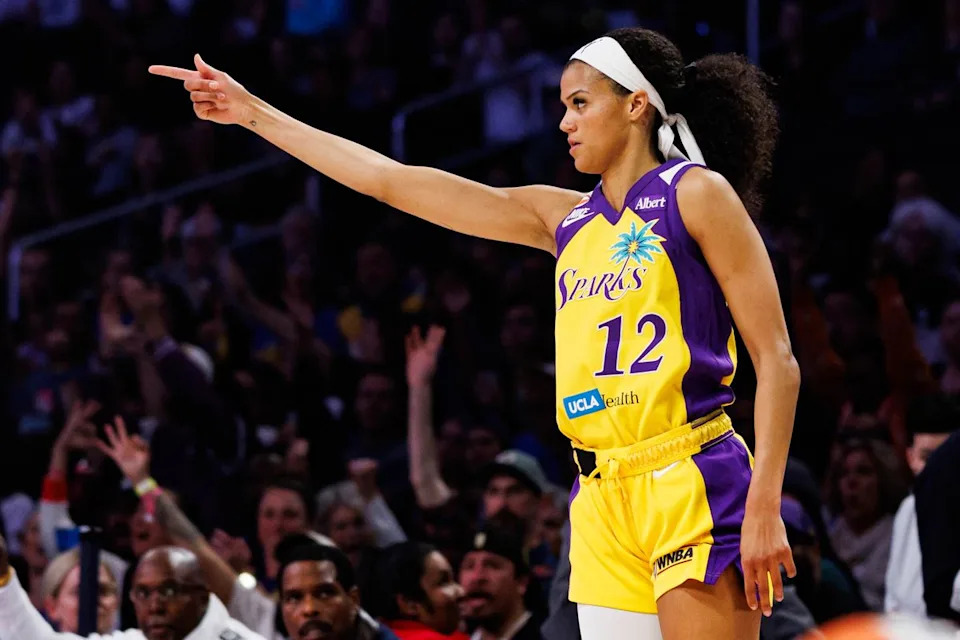 Rae Burrell #12 of the Los Angeles Sparks celebrates after making a three pointer during a WNBA game against the Toronto Tempo on May 15, 2026 at Crypto.com Arena in Los Angeles, California.