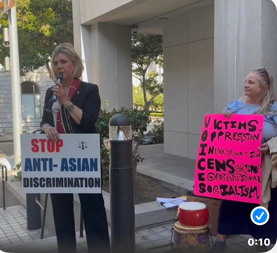 Attorney Christine Linnenbach speaks at a rally opposing the ethnic studies course. Christine Linnenbach