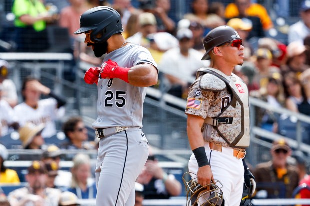 Derek Hill #25 of the Chicago White Sox celebrates his home run as Freddy Fermin #54 of the San Diego Padres looks on during the seventh inning at Petco Park on May 3, 2026 in San Diego, California. (Photo by Meg McLaughlin/Getty Images)