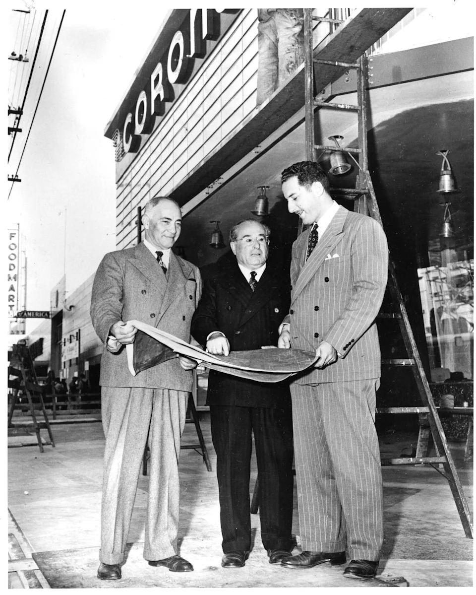San Francisco Theatres Inc. owners Samuel H. Levin, Michael Naify and Irvin M. "Bud" Levin in front of the Coronet before it first opened in 1949. (Courtesy San Francisco Public Library History Center)