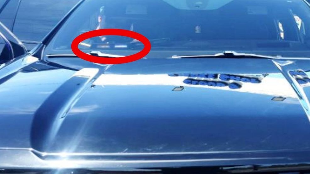 A man was arrested for impersonating an officer after police say he allegedly used flashing red and blue lights in a black GM Yukon to pull over a driver. PHOTO: BPD
